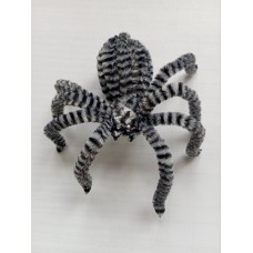 Паук серый на присоске