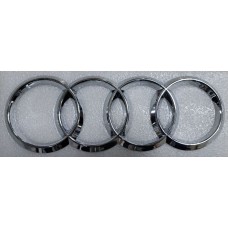 Эмблема Audi хром длина 25см ширина 8,5см (штырь)